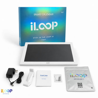 iLOOP smart calendar kit with a 15.6-inch touchscreen display, blue and green gradient retail box, power adapter, mounting bracket, instruction booklet, small hardware packet, and a silver Keep-In pouch on a white background.